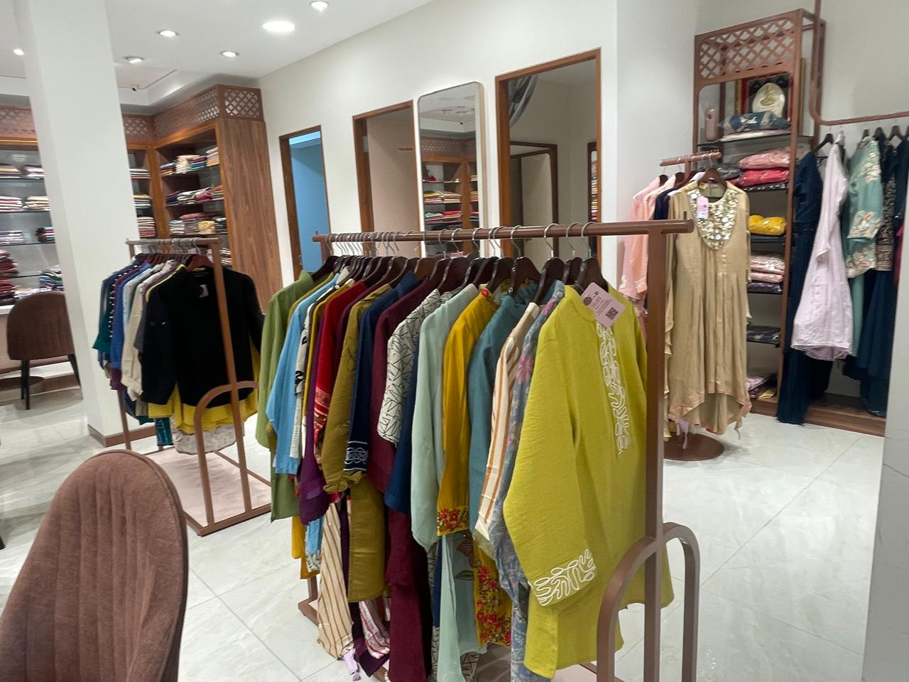 Interior clothing rack display at Khiara