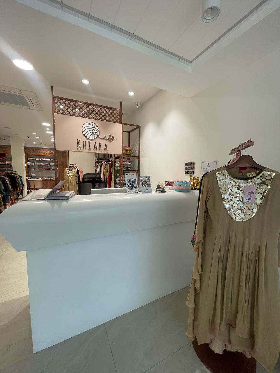 Khiara boutique with large saree wall display